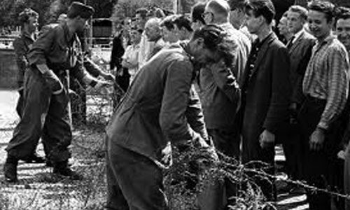 People being divided for the Berlin Wall. 